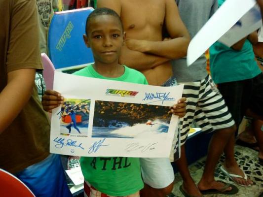 Local grom with his Jared Houston signed poster