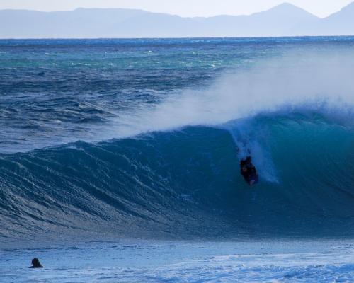 Marius Burger, take off at Koeel Bay (Caves)