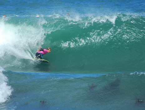 Sacha Specker, dropknee forehand bottom turn at Kalk Bay