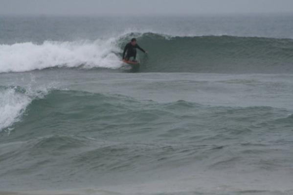 Warren Tickner, dropknee backhand trim at Nahoon Beach