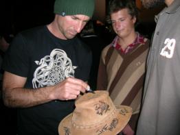 Mike Stewart :: Stewart signing the now famous hat.