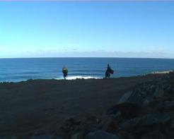 Frame grab.Byron(right) Ian (left) checking the surf..