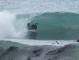 Another UFO tucking into a glassy KalkBay shack